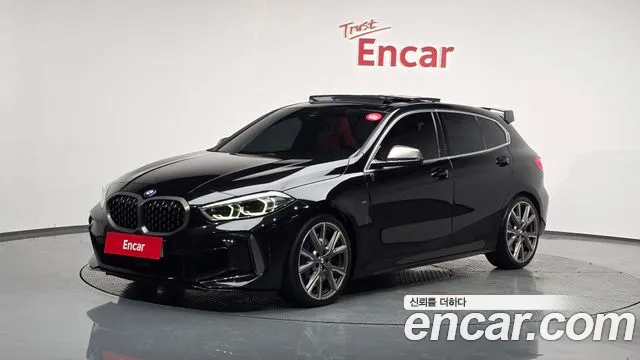 BMW 1-Series 2022 — photo 1