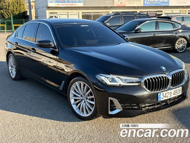 BMW 5-Series 2023 — photo 1