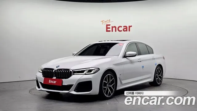 BMW 5-Series 2021 — photo 1