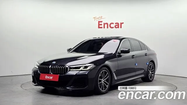 BMW 5-Series 2022 — photo 1