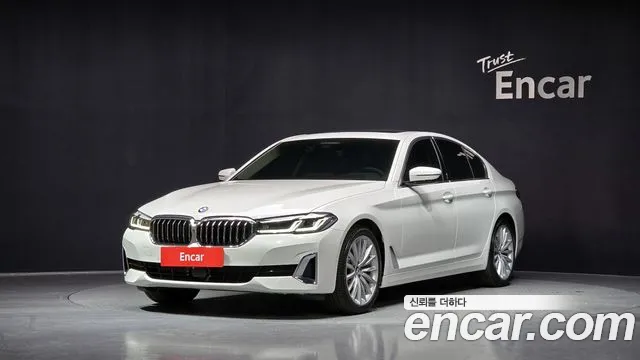 BMW 5-Series 2023 — photo 1