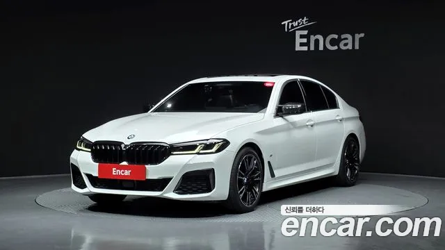 BMW 5-Series 2021 — photo 1
