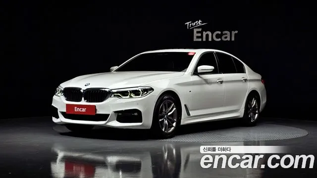 BMW 5-Series 2018 — photo 1
