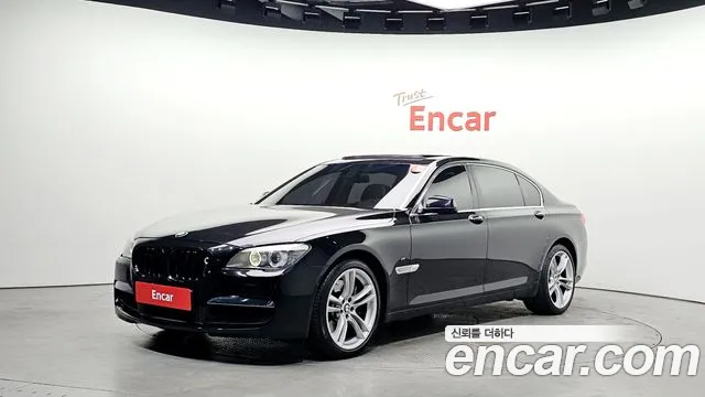 BMW 7-Series 2010 — photo 1