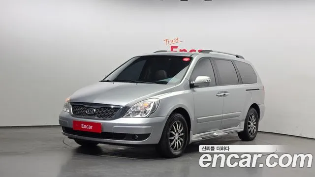Kia Canival 2010 — photo 1