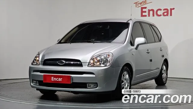 Kia Carens 2007 — photo 1