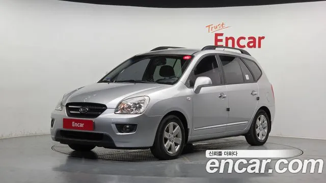 Kia Carens 2009 — photo 1