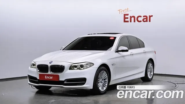 BMW 5-Series 2014 — photo 1