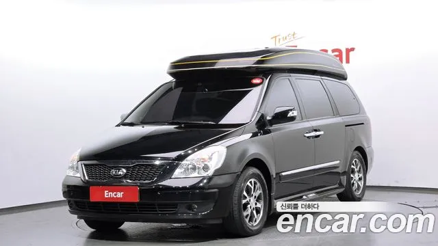 Kia Canival 2013 — photo 1
