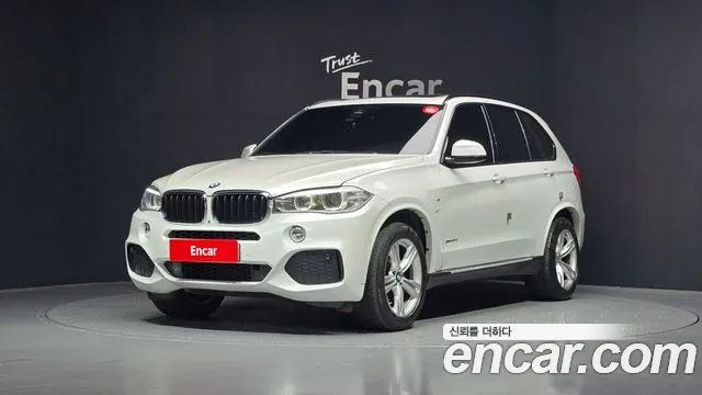 BMW X5 2018 — photo 1