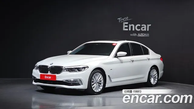 BMW 5-Series 2018 — photo 1