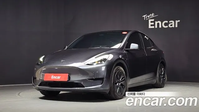 Tesla Model Y 2025 — photo 1