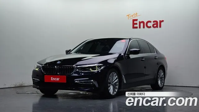 BMW 5-Series 2018 — photo 1