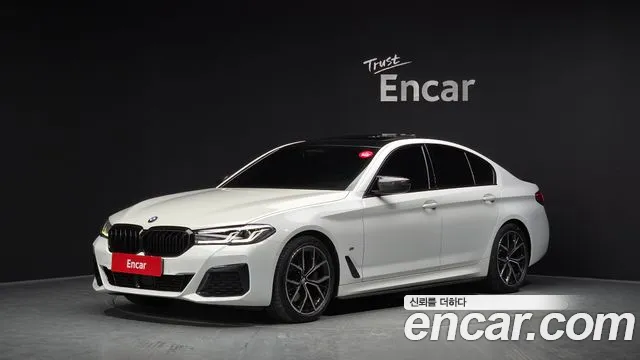 BMW 5-Series 2022 — photo 1