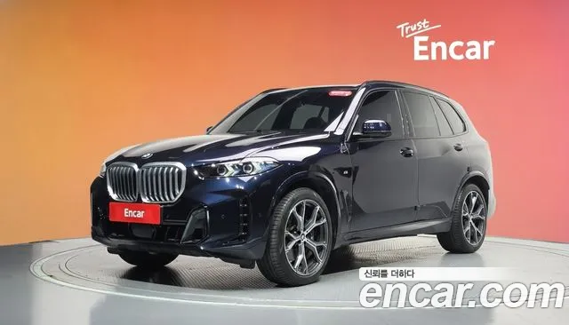 BMW X5 2024 — photo 1