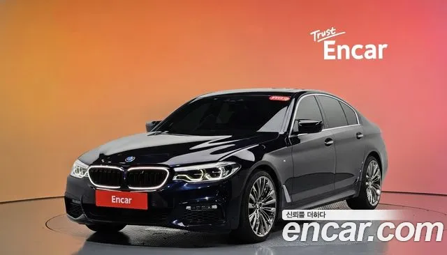 BMW 5-Series 2018 — photo 1