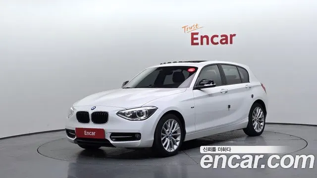 BMW 1-Series 2015 — photo 1