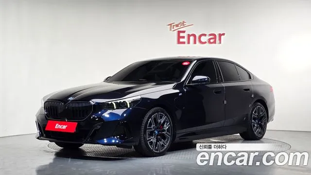 BMW 5-Series 2024 — photo 1