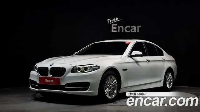 BMW 5-Series 2014 — photo 1
