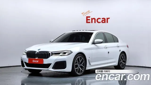 BMW 5-Series 2022 — photo 1