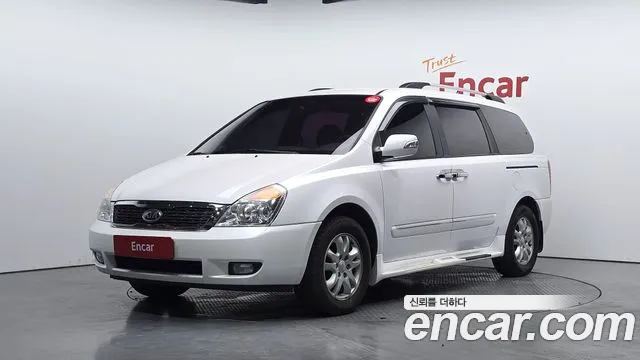 Kia Canival 2012 — photo 1