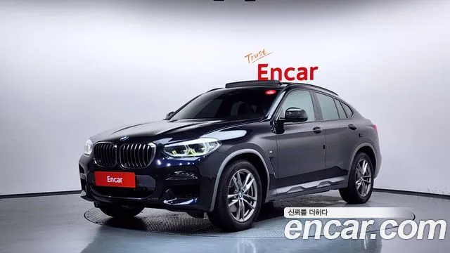 BMW X4 2021 — photo 1