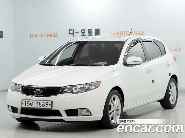 Kia Porte 2013 — photo 1