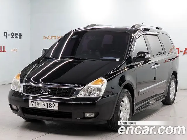 Kia Canival 2012 — photo 1