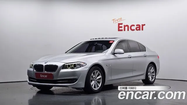 BMW 5-Series 2010 — photo 1