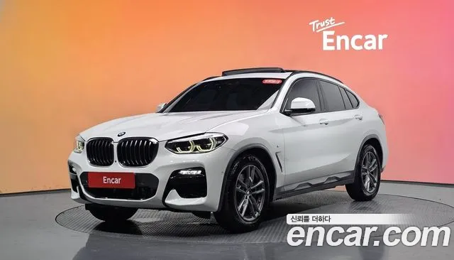 BMW X4 2021 — photo 1