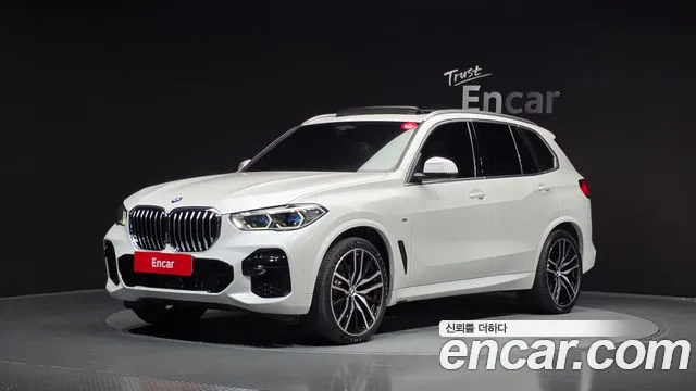 BMW X5 2022 — photo 1