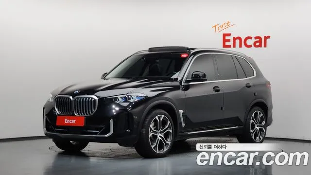 BMW X5 2024 — photo 1