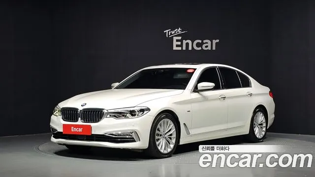 BMW 5-Series 2018 — photo 1