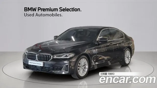 BMW 5-Series 2023 — photo 1