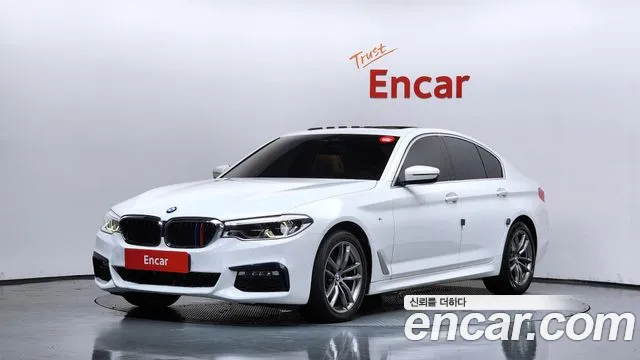 BMW 5-Series 2018 — photo 1