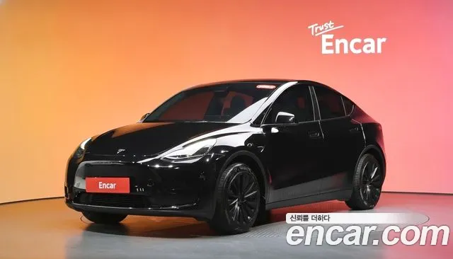 Tesla Model Y 2024 — photo 1