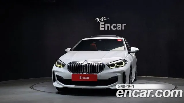 BMW 1-Series 2021 — photo 1