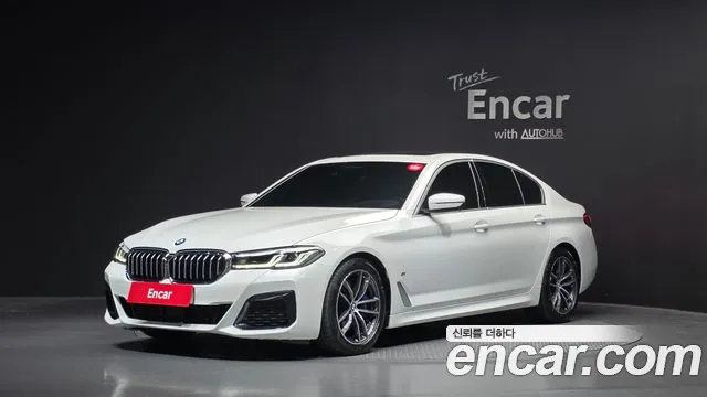 BMW 5-Series 2023 — photo 1