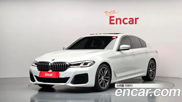BMW 5-Series 2023 — photo 1