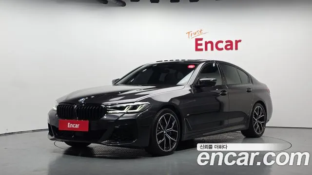 BMW 5-Series 2023 — photo 1