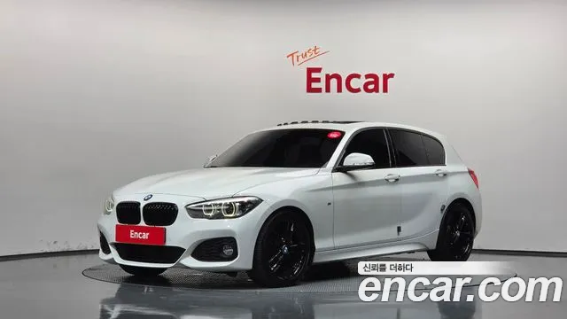 BMW 1-Series 2018 — photo 1