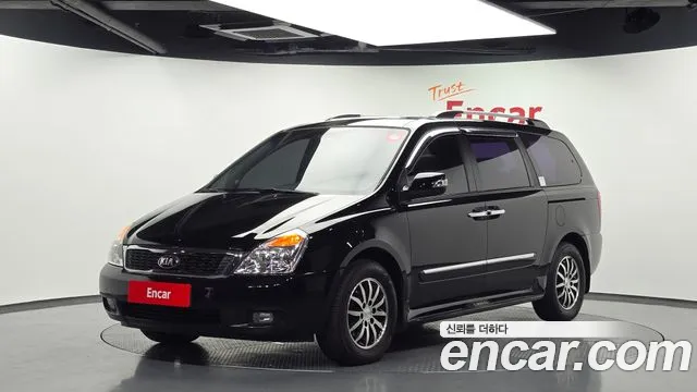 Kia Canival 2013 — photo 1