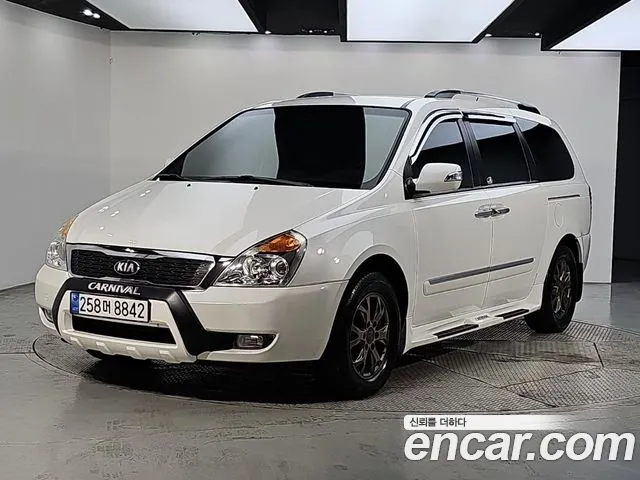 Kia Canival 2013 — photo 1