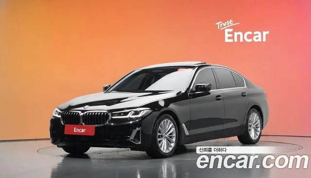 BMW 5-Series 2023 — photo 1