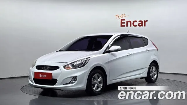 Hyundai Accent 2012 — photo 1