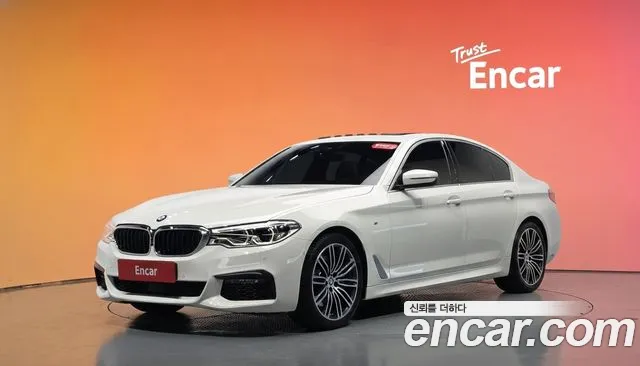 BMW 5-Series 2019 — photo 1