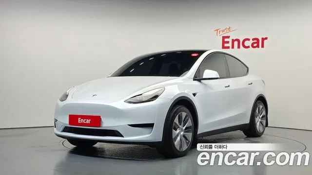 Tesla Model Y 2024 — photo 1