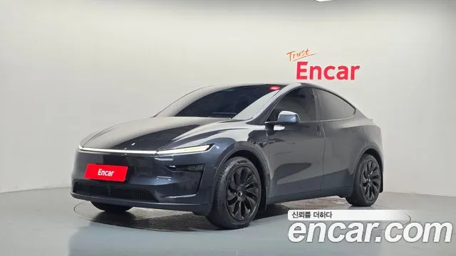 Tesla Model Y 2025 — photo 1