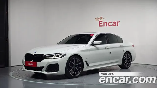 BMW 5-Series 2022 — photo 1