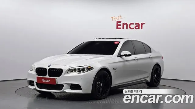 BMW 5-Series 2015 — photo 1